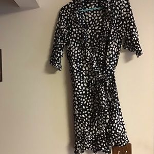 Woman’s ruffled wrap dress. Size 14 Made by find.